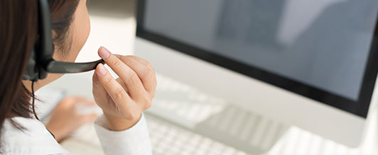 customer service representative at computer