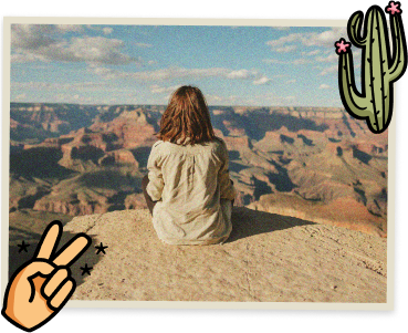 Woman looking out over the Grand Canyon.