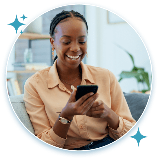A woman smiles as she logs activity in the Star Trak mobile app.